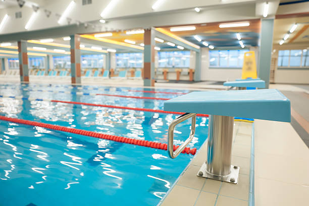 Swimming pool. Picture of a modern empty swimming pool with blue water