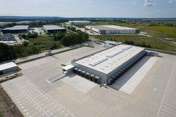 istock Logistics Park: Aerial View of Distribution Warehouses 2215412636