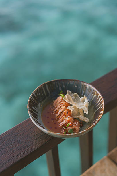 Serving of sashimi  at tropical beach cafe