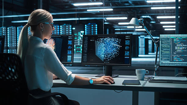 istock Blonde Woman Working on Her Computer with Display Shows Neural Network, Artificial Intelligence Simulation, Programming Language of Coding. Future Technologies 2215424873
