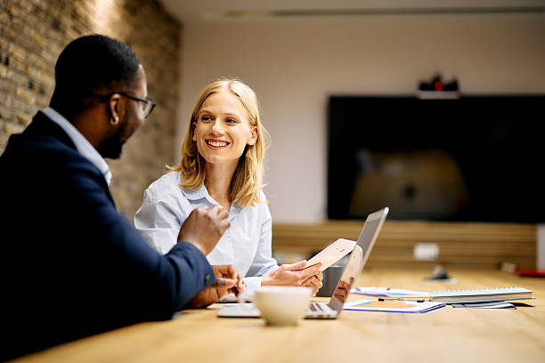 istock Business partners discussing during a meeting in the office 2215425178