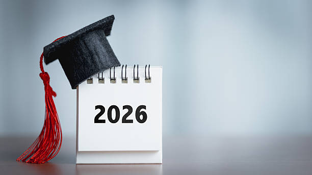istock Graduation cap and 2026 new year calendar on the table. 2215427700