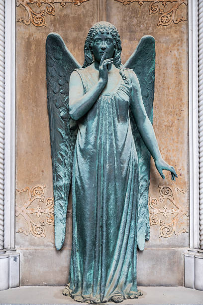 Monument of old angel in Catholic cemetery