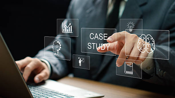 istock Case Study Education concept. Business person hand touching case study icon on virtual screen. Analysis of the situation to find a solution 2215430407