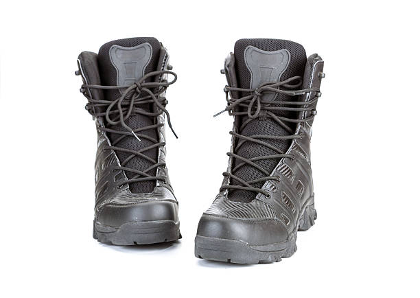 A black hiking boots with rugged design, front view, isolated on white background. these durable boots feature sturdy laces and high ankle for support, ideal for outdoor adventures