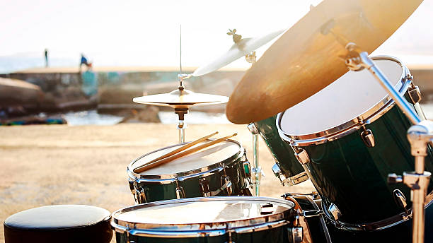 istock Drum kit  before the performance  by  the sea at sunset 2215431927