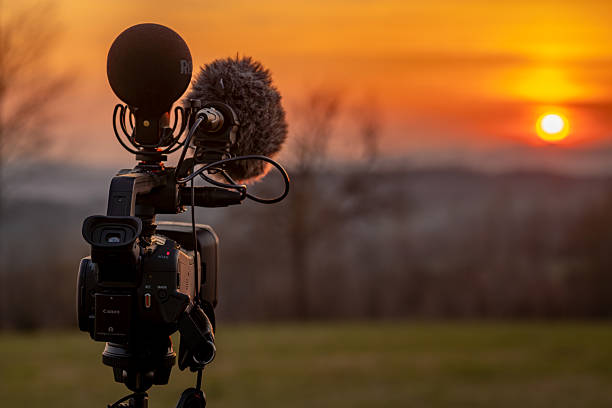 Female reporter journalist on the spot, holding microphone