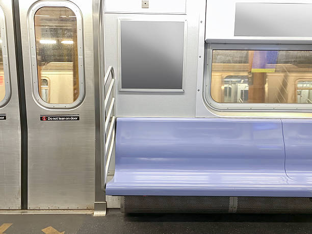 istock Subway seats and blank billboard 2215446088