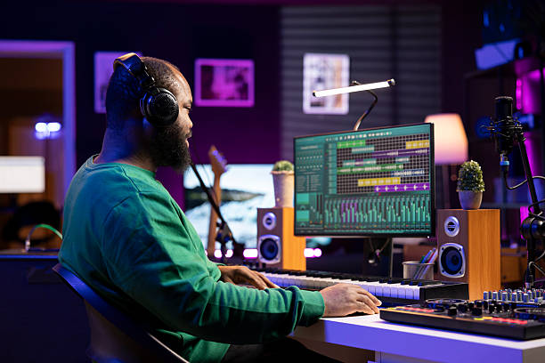 istock Music designer adjusting old audio files with sound effects 2215450653