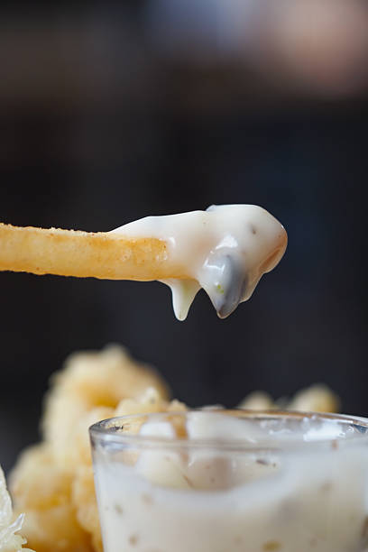 istock Crispy french fry with creamy dip in a restaurant setting 2215452366