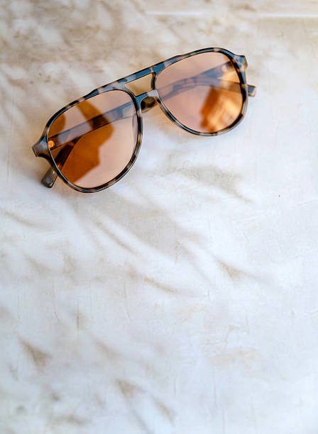 istock Summer sunglasses with orange glasses 2215456407