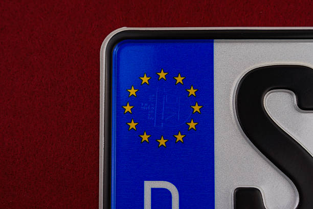 istock German Vehicle License Plate on red Background 2215456795