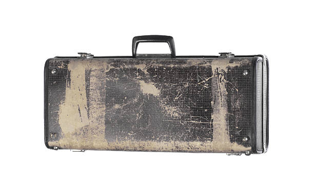 istock old shabby brown suitcase isolated on white background 2215459127