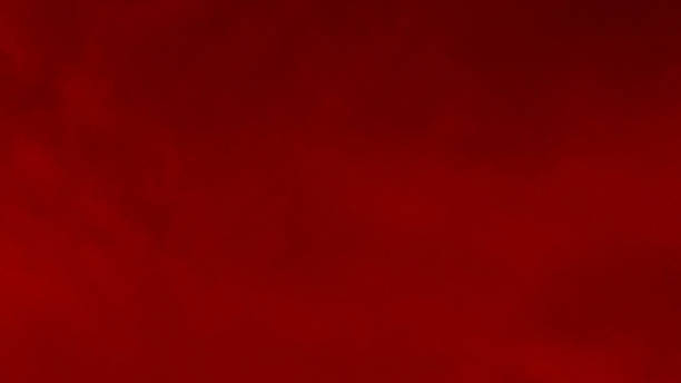 istock Red cloud texture background. Blurred photo of red sky with clouds. 2215459224