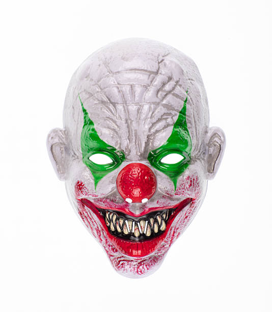 istock Evil clown mask isolated on white background 2215460169