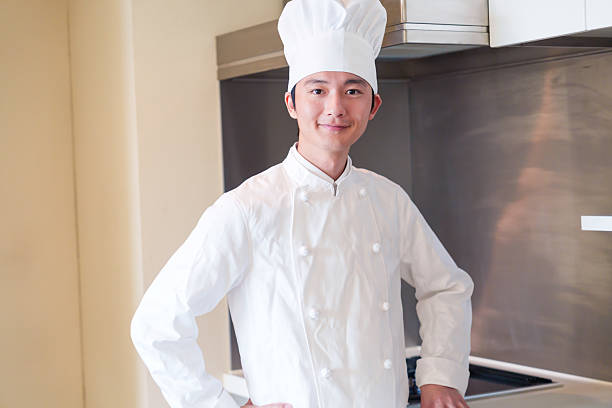 istock Cook man wearing a cook's hat. 2215461042
