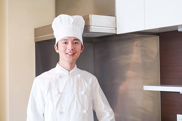 istock Cook man wearing a cook's hat. 2215461051