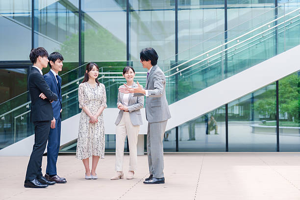 istock Business people chatting outdoors 2215461847
