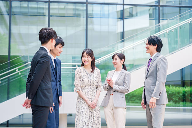 istock Business people chatting outdoors 2215461854