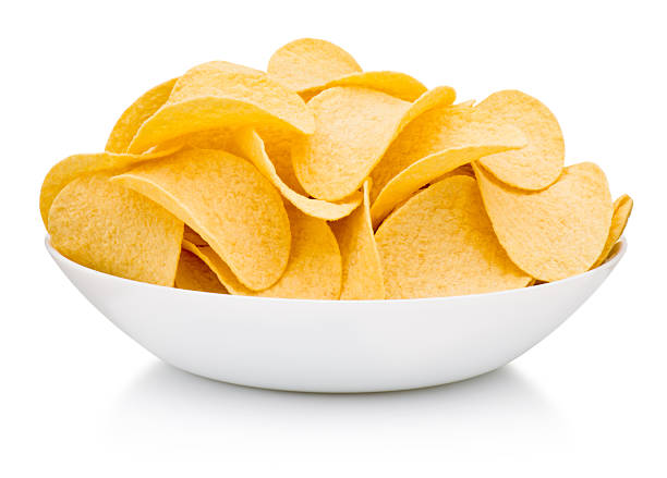 istock Potato chips in plate isolated on white background 2215462323