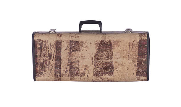 istock old shabby brown suitcase isolated on white background 2215462911