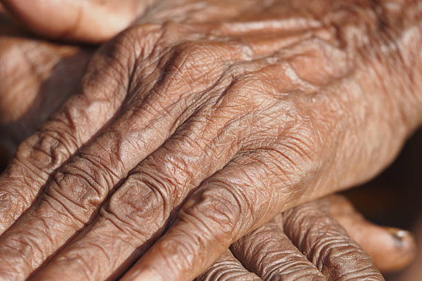Hands showing the passage of time in natural light