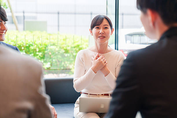 istock Career woman discussing in her office 2215466358