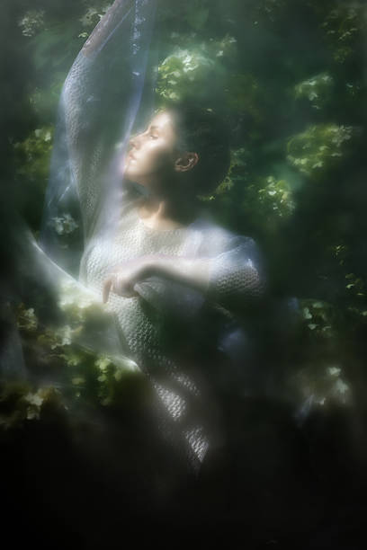 istock Eletant Woman Posing between Hortensias 2215466700