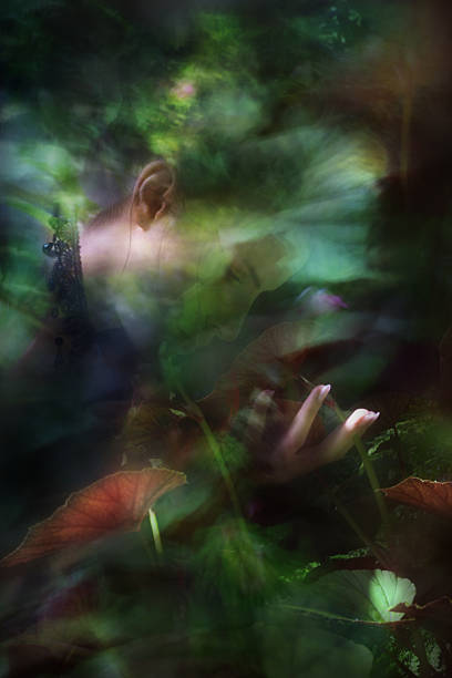 istock Begonia Leaf Holded by Exotic Woman 2215466714