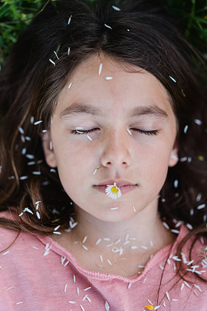 istock Girl with Daisy Daydream 2215471148