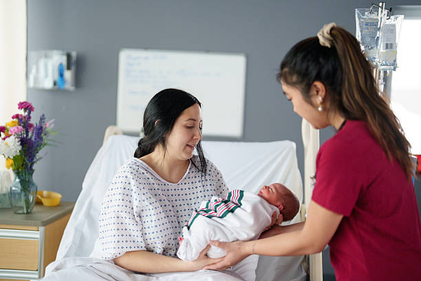 istock Women Supporting Women in Childbirth 2215487375