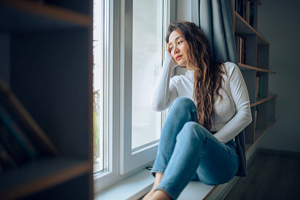 istock Worried Asian woman. 2215487485