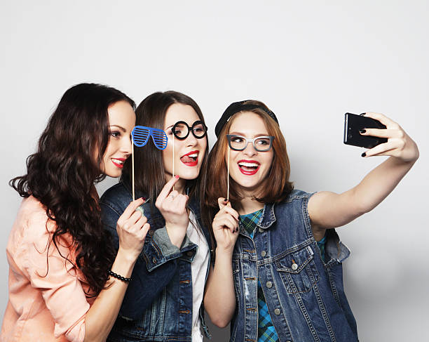 istock funny girls, ready for party 2215488536