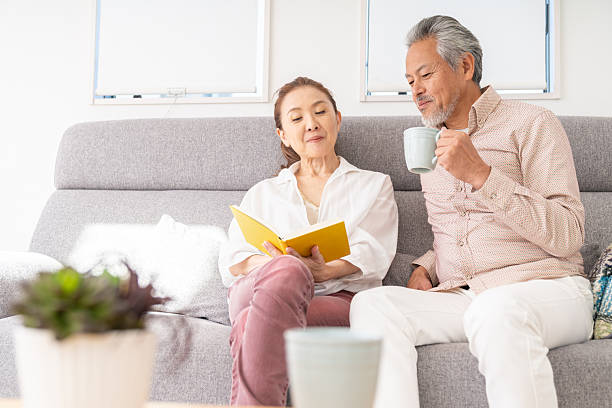 istock asian senior age couple who reads a book, 2215497257