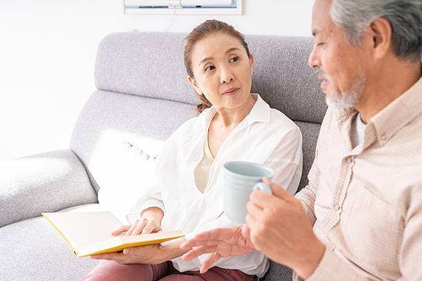 istock asian senior age couple who reads a book, 2215497267