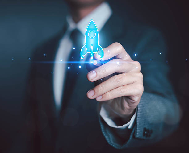 istock Startup business start-up with technology background as a rocket image conveying the idea of ​​launching a well-planned new business. 2215501326