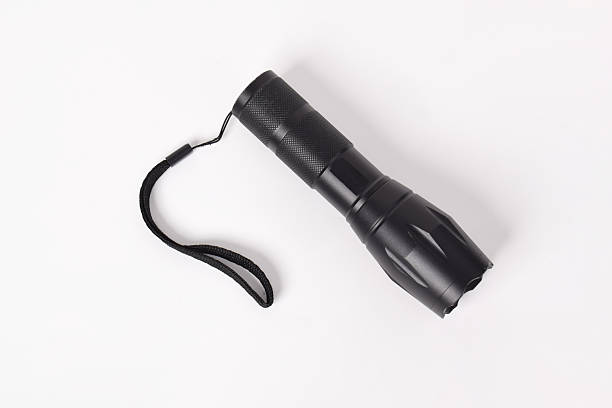 Modern metal LED flashlight in black color