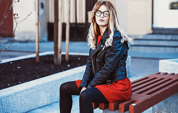 istock Girl Sitting on Bench 2215506461