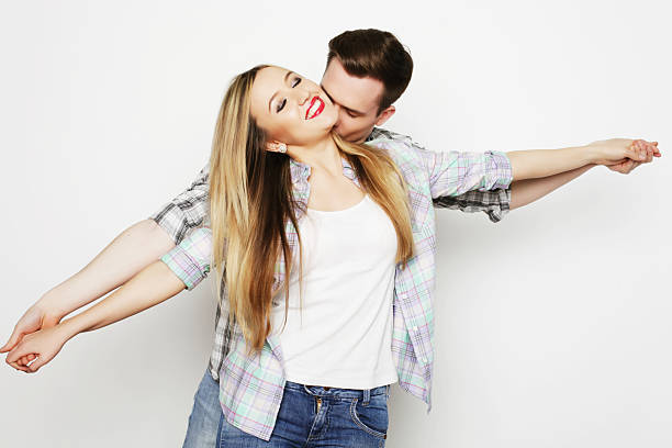 istock Happy young loving couple holding hands 2215507522