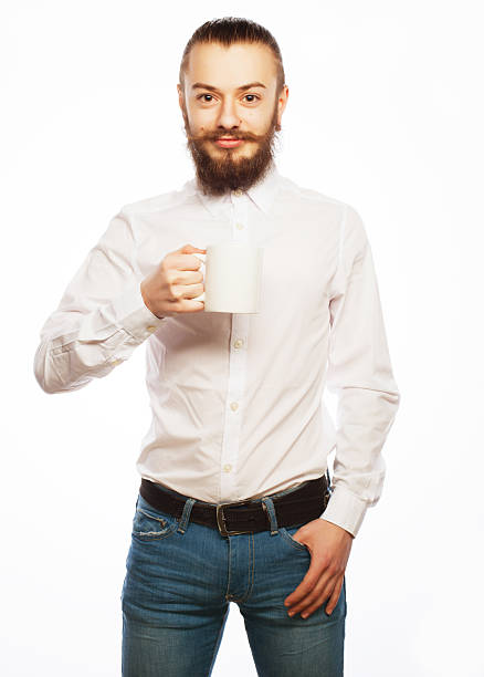 istock young man drinking a cup of coffee 2215507906