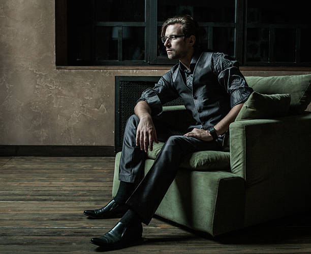 istock Businessman sitting on an armchair 2215511780