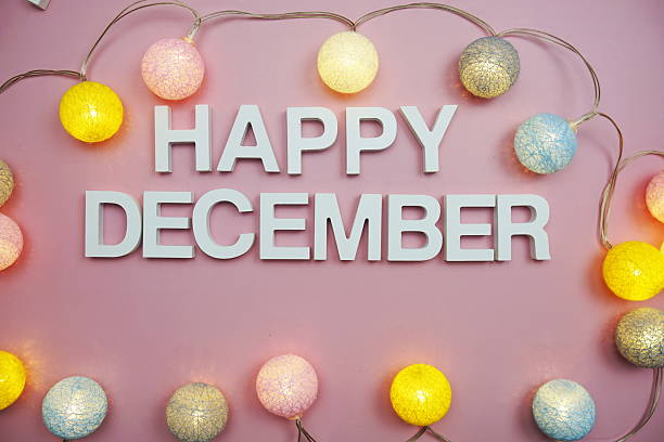istock Happy December alphabet letters on pink background 2215513315