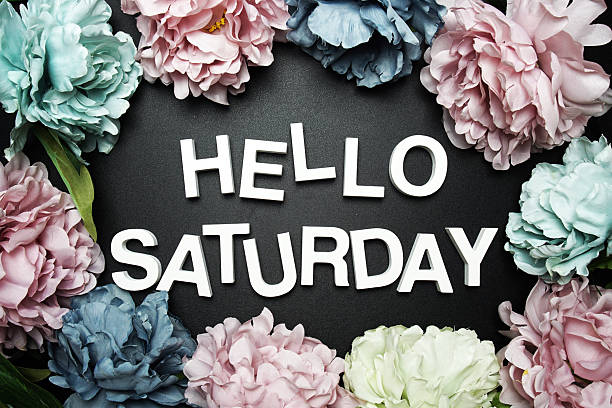 istock Hello Saturday alphabet letter with flower decoration on black background 2215513343