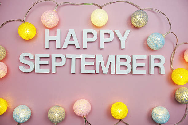 istock Happy September alphabet letters on pink background 2215513502