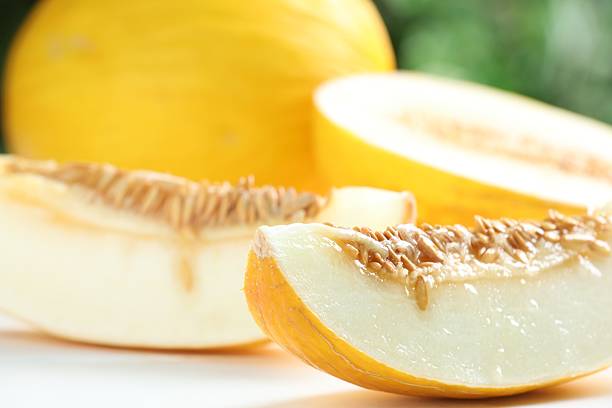 istock Fresh ripe melons on white table, closeup 2215513515