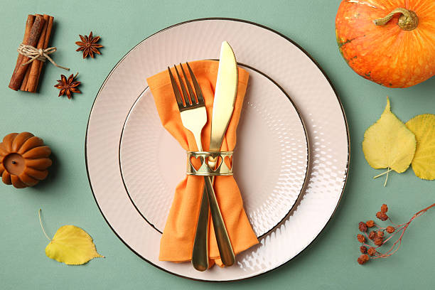 istock Beautiful table setting with autumn decor on turquoise background, flat lay 2215514332