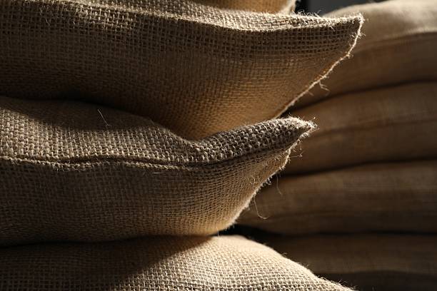 Closeup view of many natural burlap sacks