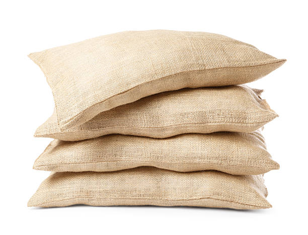 istock Group of burlap sacks isolated on white 2215514477