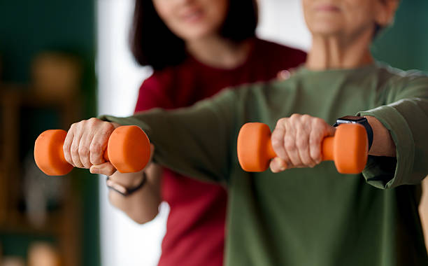 istock Senior woman doing dumbbell exercise 2215515173
