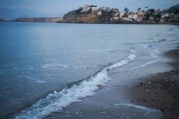 Blue hour of sunrise, along with some waves in the Mediterranean Sea